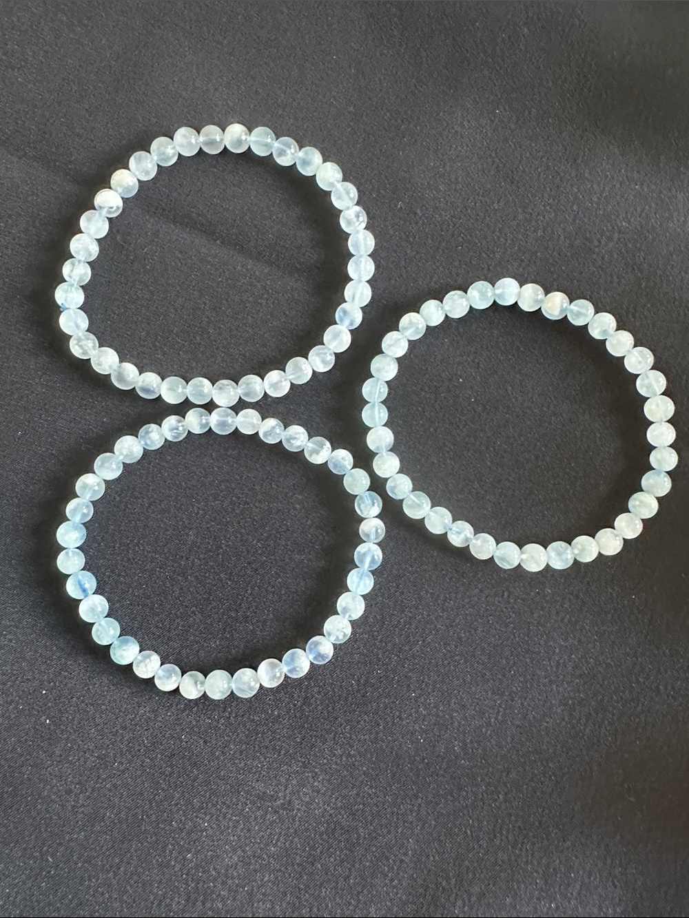 Aquamarine NWOT genuine gemstone stretch bracelet. Appx. 6-3/4”